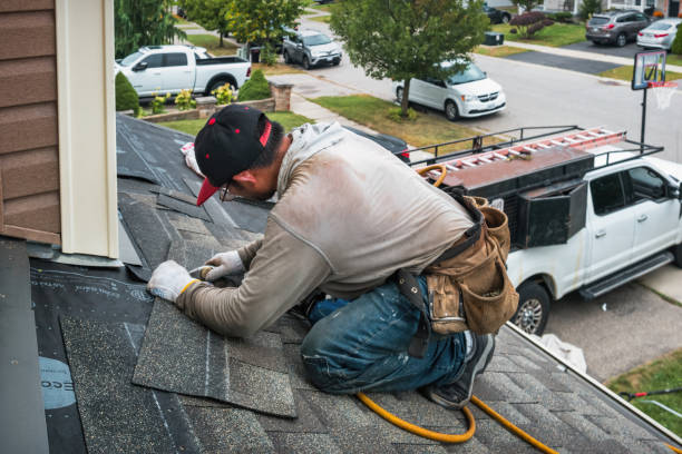 Professional Roofing technician working in Vacaville, CA